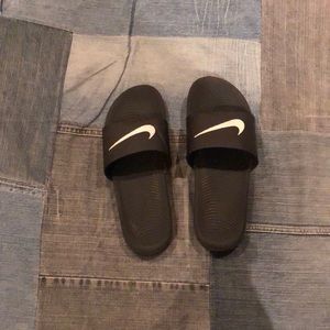 Size 10.5 black Nike slides